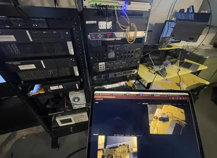 Physical trashmonitor capture setup pointed at the hardware bench